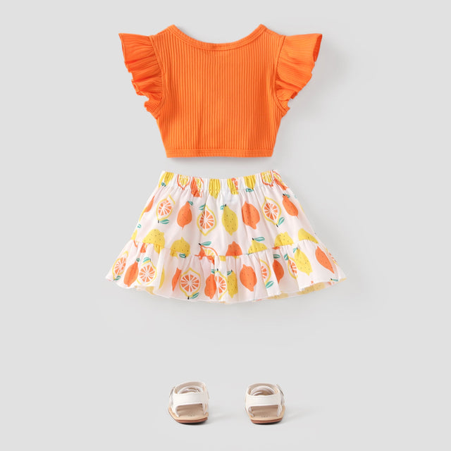 2pcs Baby Girl Solid Cotton Ribbed Ruffle - sleeve Twist Knot Crop Top and Allover Fruit Print Skirt Set - MomYom PK