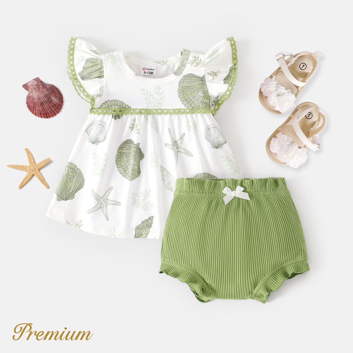 2pcs Baby Girl Naia™ Ocean Print Flutter-sleeve Top and Ruffle Trim Solid Shorts سیٹ